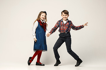 Image showing Cute stylish children on white studio background