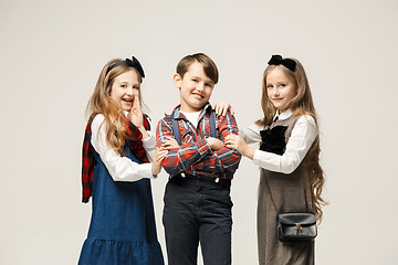 Image showing Cute stylish children on white studio background