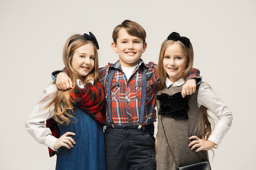 Image showing Cute stylish children on white studio background