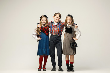 Image showing Cute stylish children on white studio background