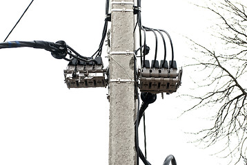 Image showing electric pole with attachments