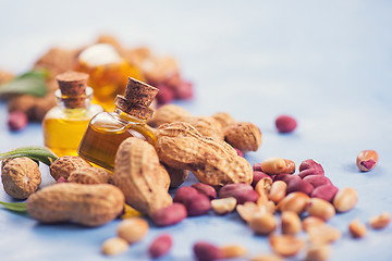 Image showing Natural peanut with oil in a glass