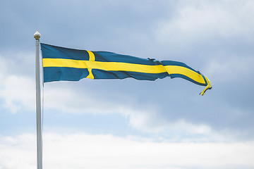 Image showing Swedish pennant flag on a flagpole in the wind