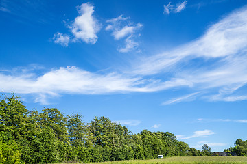 Image showing Camping trailer on a green field