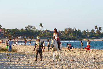 Image showing Malagasy beauty, beautiful girls ride horse