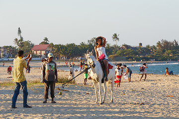 Image showing Malagasy beauty, beautiful girls ride horse on the beach