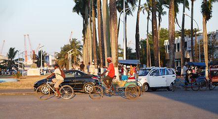 Image showing Traditional rickshaw bicycle with malagasy peoples in Toamasina, Madagascar