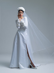 Image showing young bride in a wedding dress with a veil