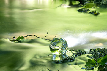 Image showing Crystal ball in a river in the spring