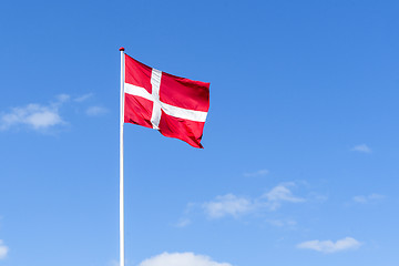 Image showing The danish flag in red and white waving in the wind