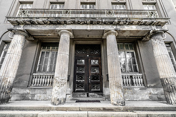 Image showing Greek pillar building with weathered windows