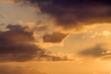 Image showing Colorful sunset with fluffy clouds in the sky