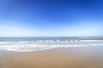 Image showing Beach in the summer with water coming in