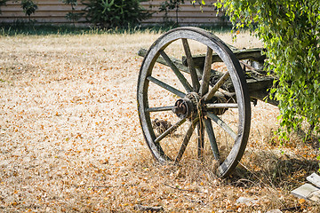 Image showing Old wagon wheel on a carriage