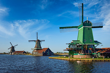 Image showing Windmills at Zaanse Schans in Holland on sunset. Zaandam, Nether