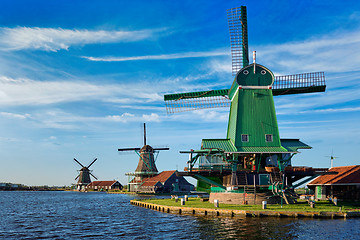 Image showing Windmills at Zaanse Schans in Holland on sunset. Zaandam, Nether