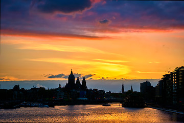 Image showing Amsterdam cityscape skyline with  Church of Saint Nicholas on su