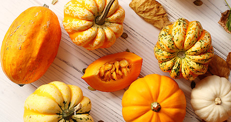 Image showing Orange pumpkins laid in disorder