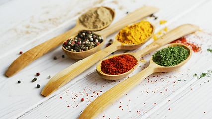 Image showing Composition of wooden spoons with spices