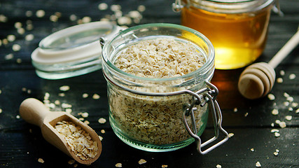 Image showing Oat and honey in glass jars