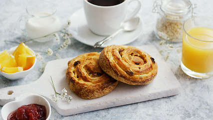 Image showing Sweet buns on board for breakfast