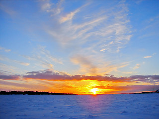 Image showing Winter sunset over frozen Baltic Sea in Finland