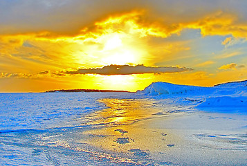 Image showing Winter sunset over frozen Baltic Sea in Finland