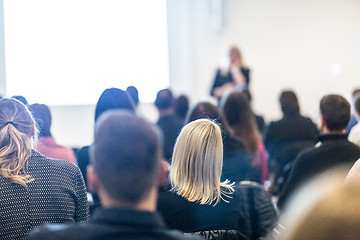 Image showing Woman giving presentation on business conference workshop.