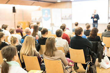 Image showing Business speaker giving a talk at business conference event.