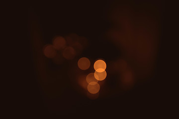 Image showing Bokeh lights in orange golden colors on brown background