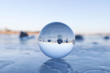 Image showing Crystal ball on a frozen lake in the winter