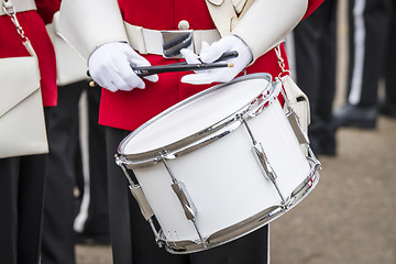 Image showing Soldier drummer in red uniform