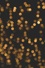 Image showing Bokeh light with glittering golden flares