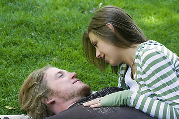 Image showing Young couple hugging in a park