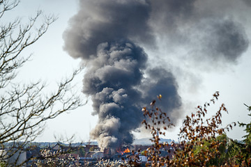 Image showing House on fire in a city