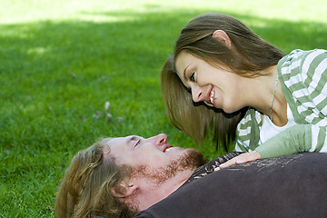 Image showing Young couple hugging in a park