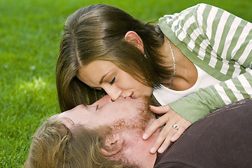 Image showing Young couple kissing in the Park