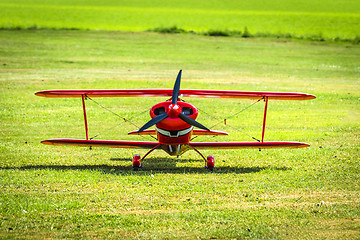 Image showing Red veteran plane ready to take off