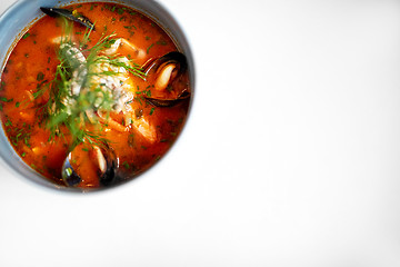 Image showing seafood soup with fish and blue mussels in bowl