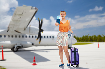 Image showing teenage girl with travel bag and airplane ticket
