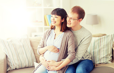 Image showing happy pregnant wife with husband at home