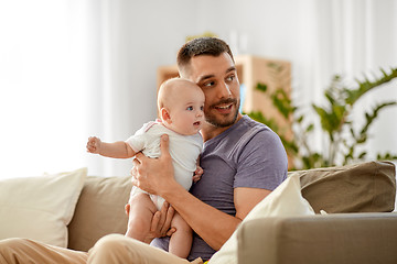 Image showing father with little baby girl at home