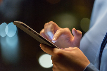 Image showing close up of businesswoman hands with smartphone