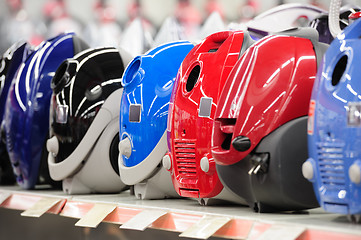 Image showing Row of vacuum cleaners in appliance store