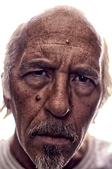 Image showing backlit Stylized portrait of older man with goatee