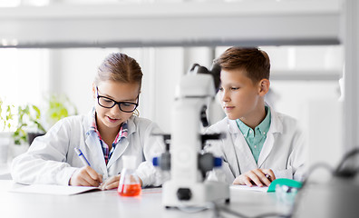 Image showing kids studying chemistry at school laboratory