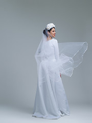 Image showing young bride in a wedding dress with a veil