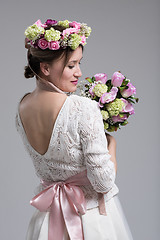 Image showing bride with a bouquet  isolated on white background