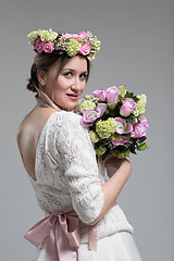 Image showing bride with a bouquet  isolated on white background