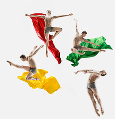 Image showing The male athletic ballet dancer performing dance isolated on white background.